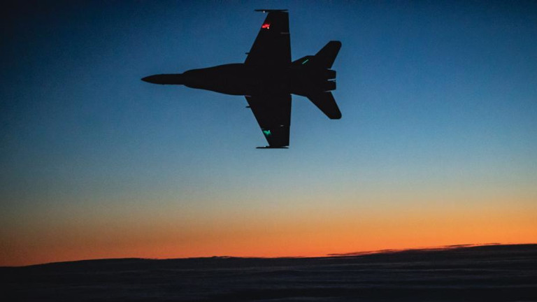 Hornet flying at the night sky