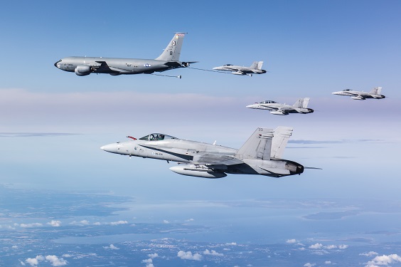 Four F/A-18 Hornet multi-role fighters and a KC-135 Stratotanker