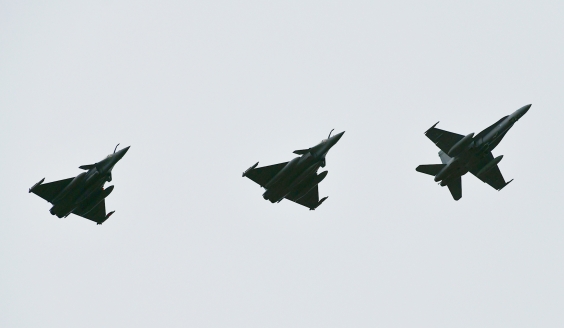 A Finnish F/A-18 Hornet and two French Rafales