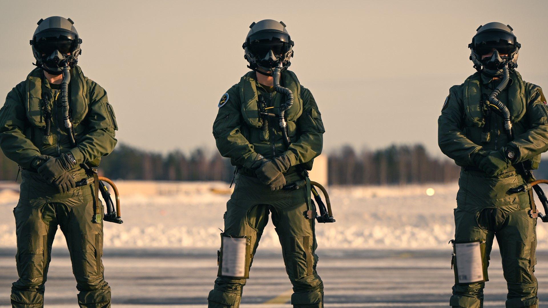 Three Norwegian student pilots.