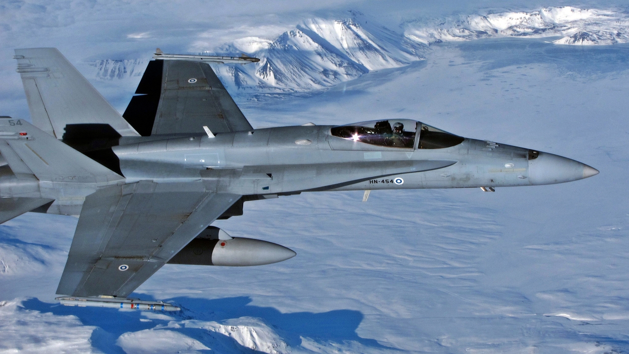 F/A-18 Hornet flying over a glacier in Iceland